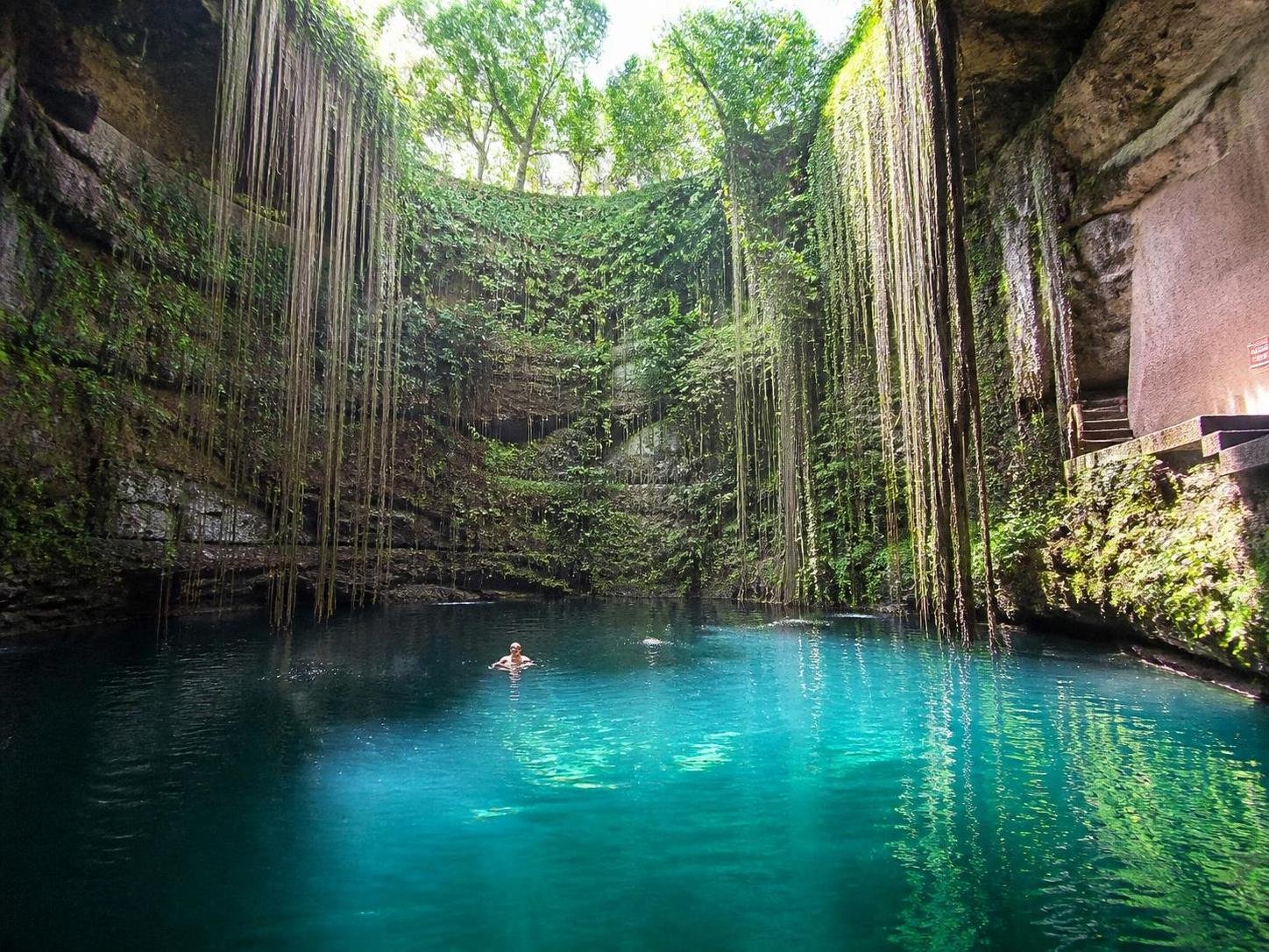 discover the stunning cenote ik kil near chichen itza, a natural wonder perfect for swimming, exploring, and experiencing the beauty of mexico's natural heritage.